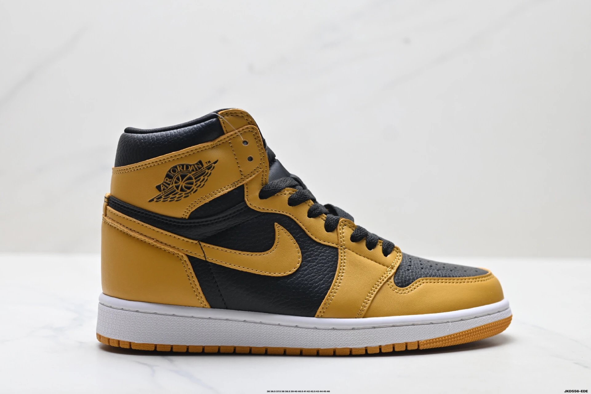 Black and yellow high-top Jordan sneakers