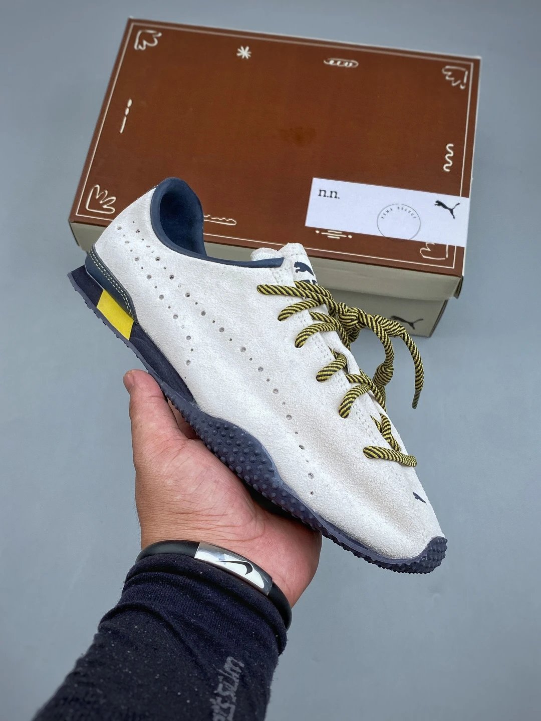 PUMA White, Navy and Yellow Suede Low-Profile Sneakers Highlighting Everyday Court Profile