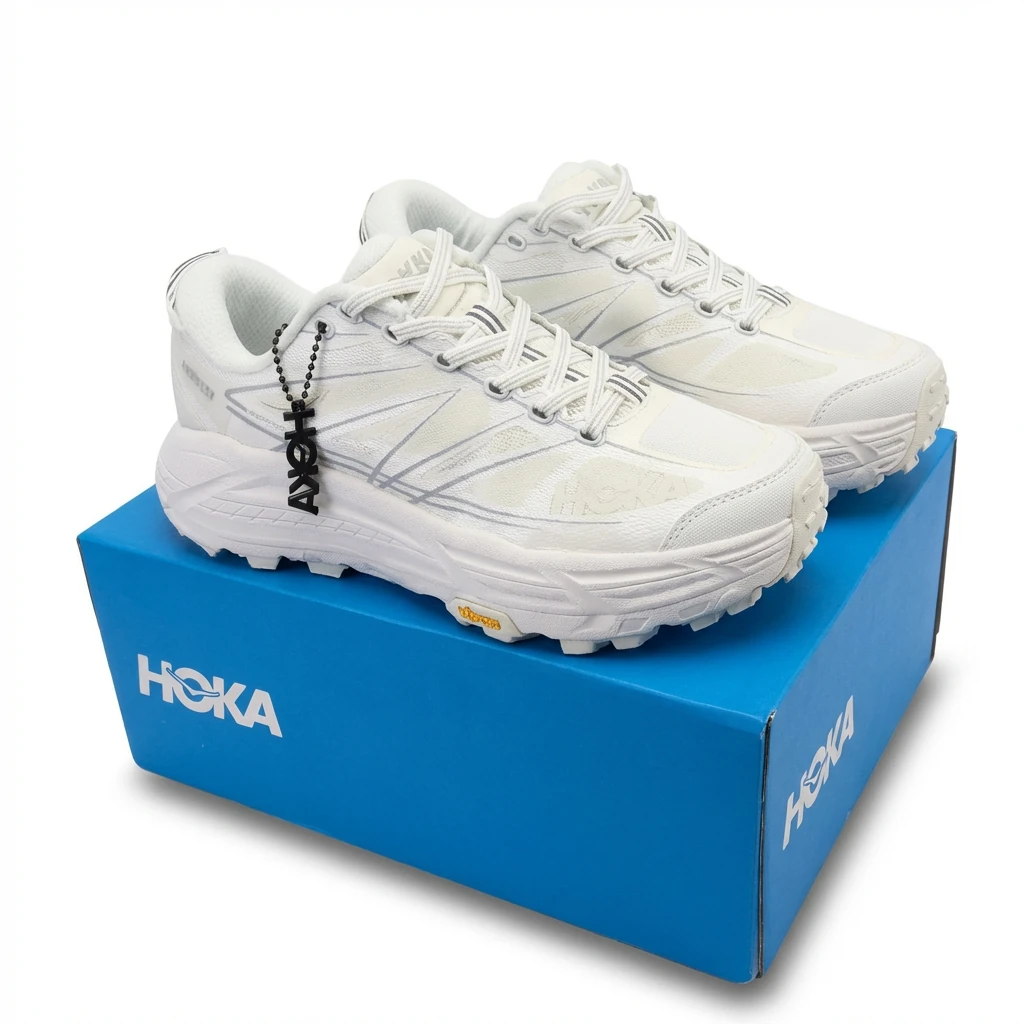 HOKA retro-style white sports shoes