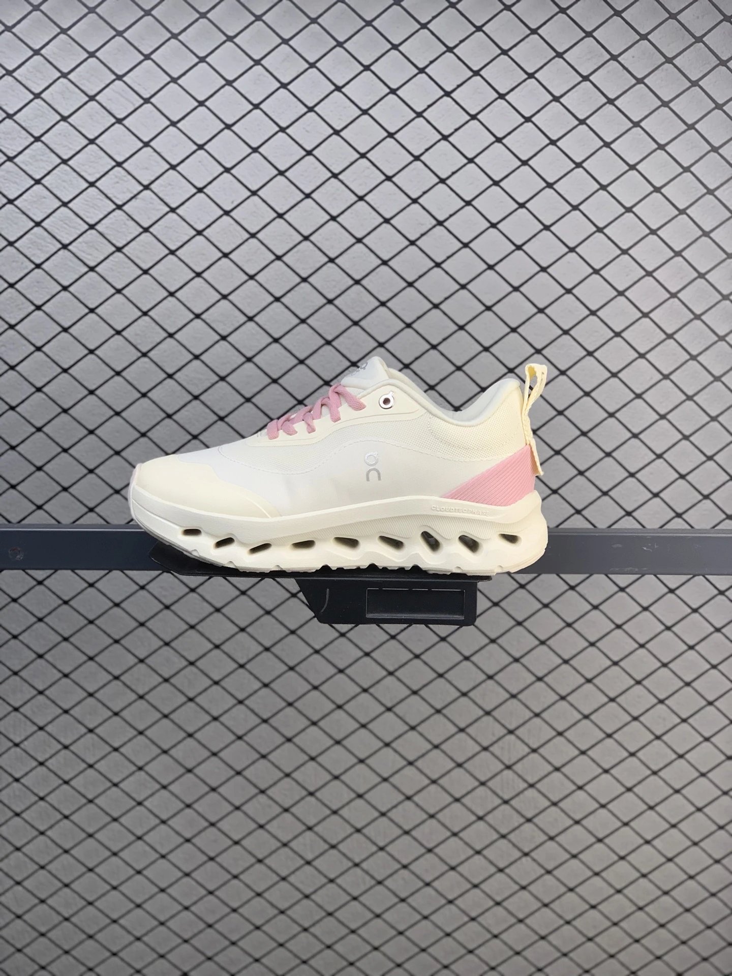 On White and Pink Cloud Runners and Rocker-Shaped Sole
