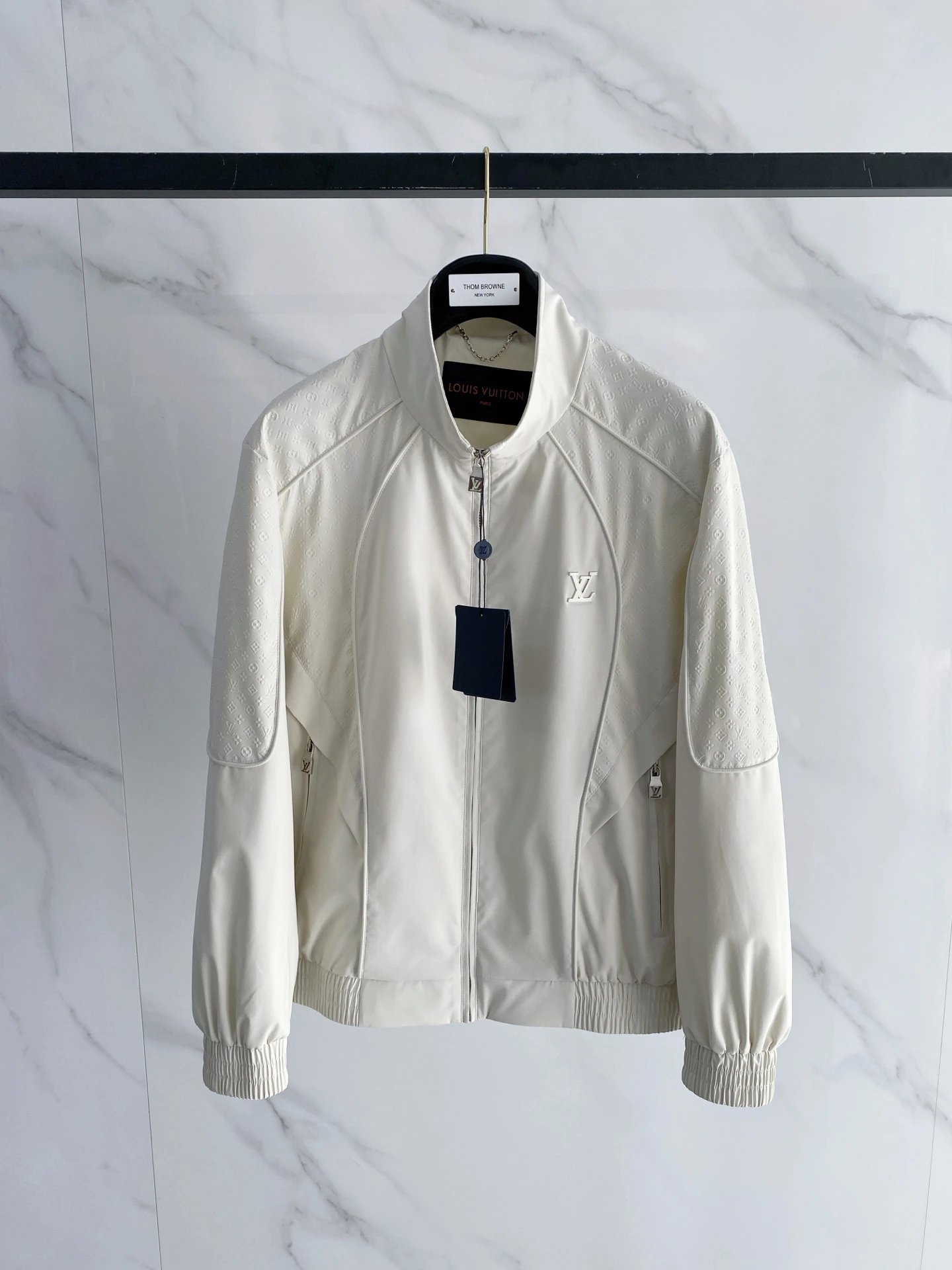 Light Jacket by Arc’teryx with Cream Zip Jacket with Small