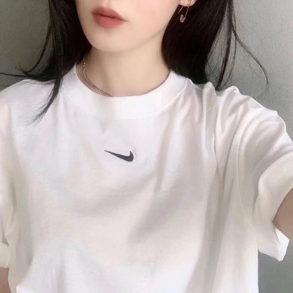 Nike Center Swoosh Logo Detail White Swoosh T-Shirt Travel Styling