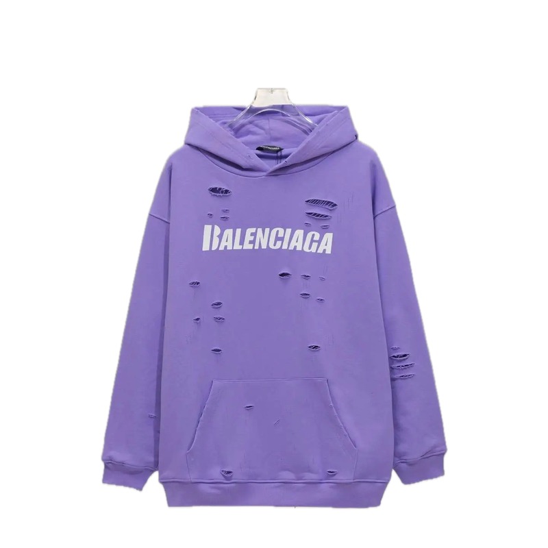 Balenciaga's ripped purple sweatshirt