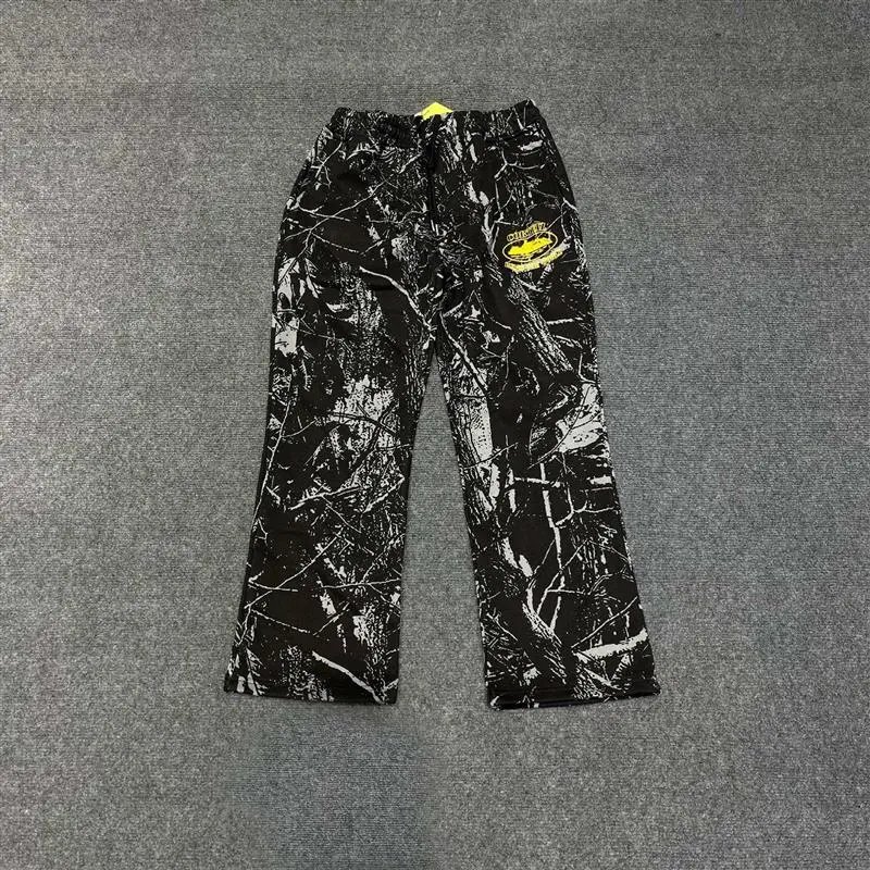 Corteiz graffiti-style black long trousers