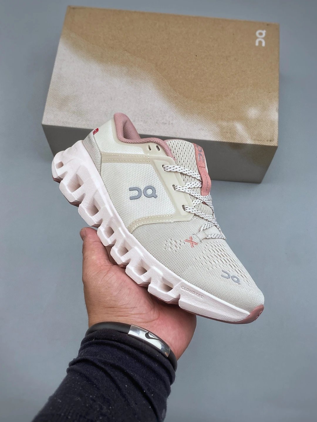 On Cream and Pink Cloud Runners and Open Mesh Panels