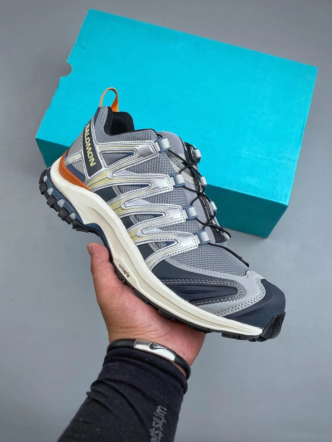 Salomon Gray Trail Runners Featuring Treaded Trail Sole