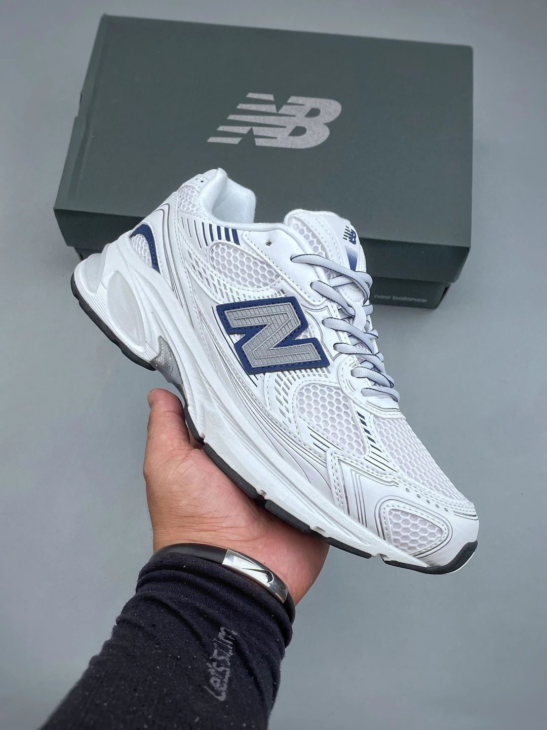 New Balance White and Navy Running Shoes Defined by Classic Running Profile