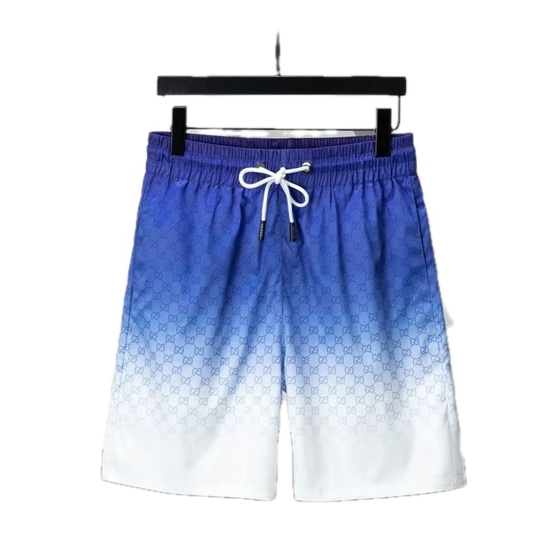 Gucci gradient-style blue and white shorts
