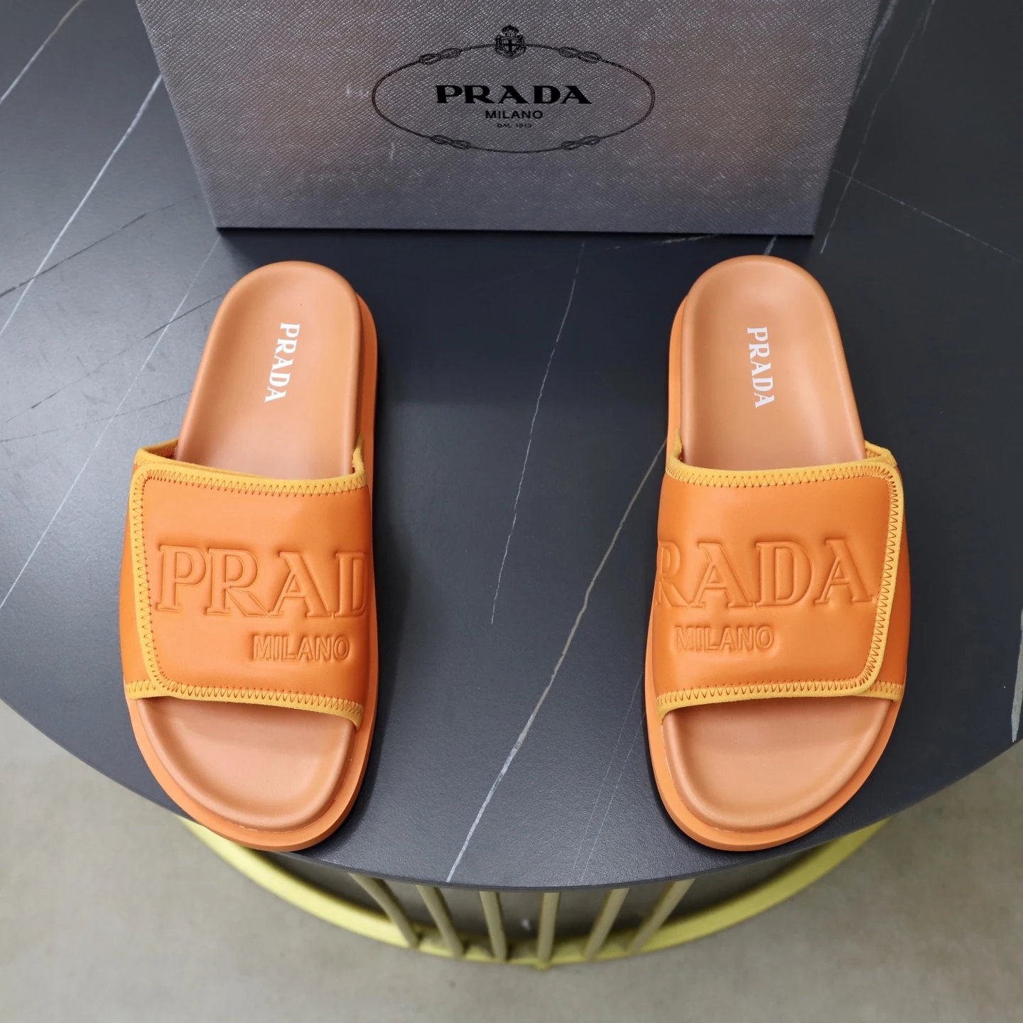 Prada Embossed Light Luxury Style Orange Slide Sandals