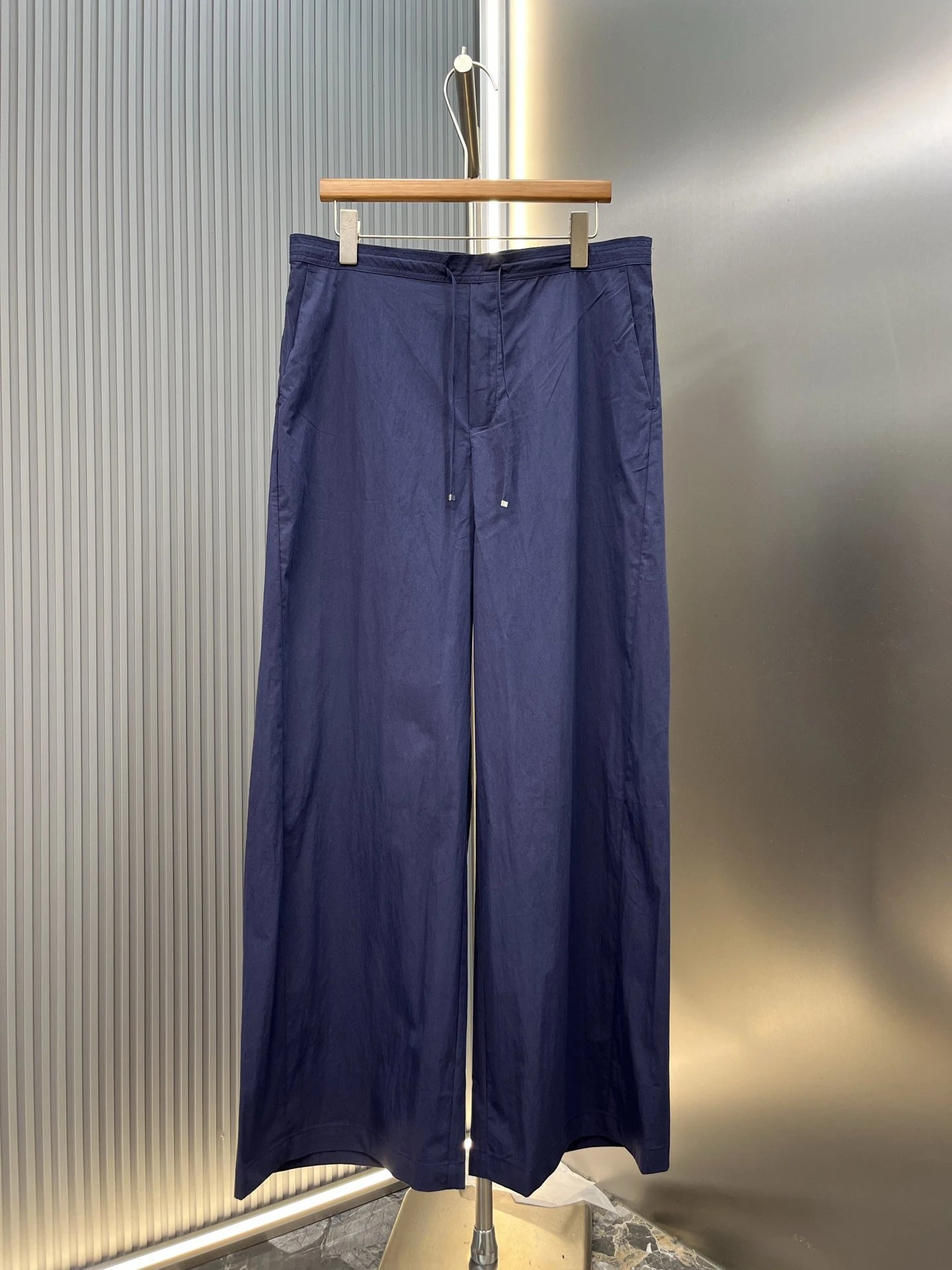 Navy Wide-Leg Trousers with adjustable drawstring waist and fluid straight shape