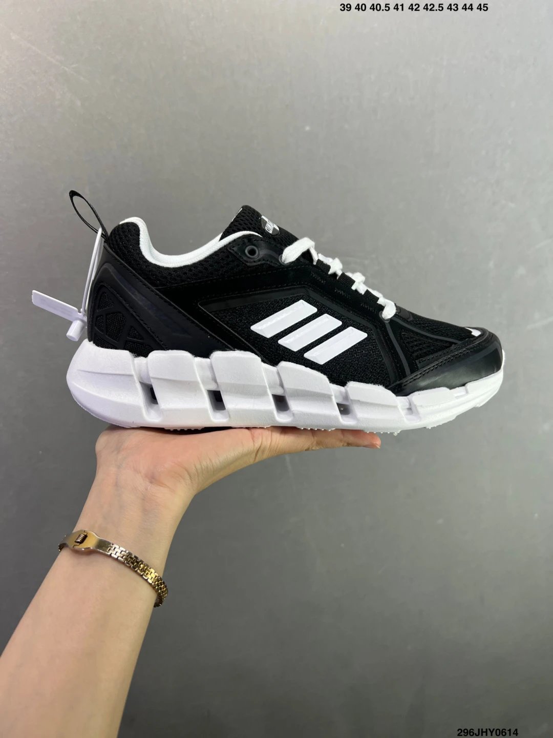 Adidas Black and White Cage Runners Defined by Sculpted Cushioning