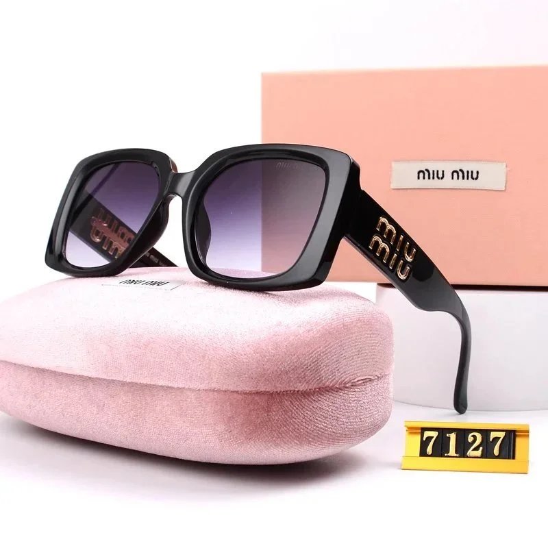 Miu Miu Compact Oversized sunglasses Black Oval Sunglasses for Smart Casual Looks