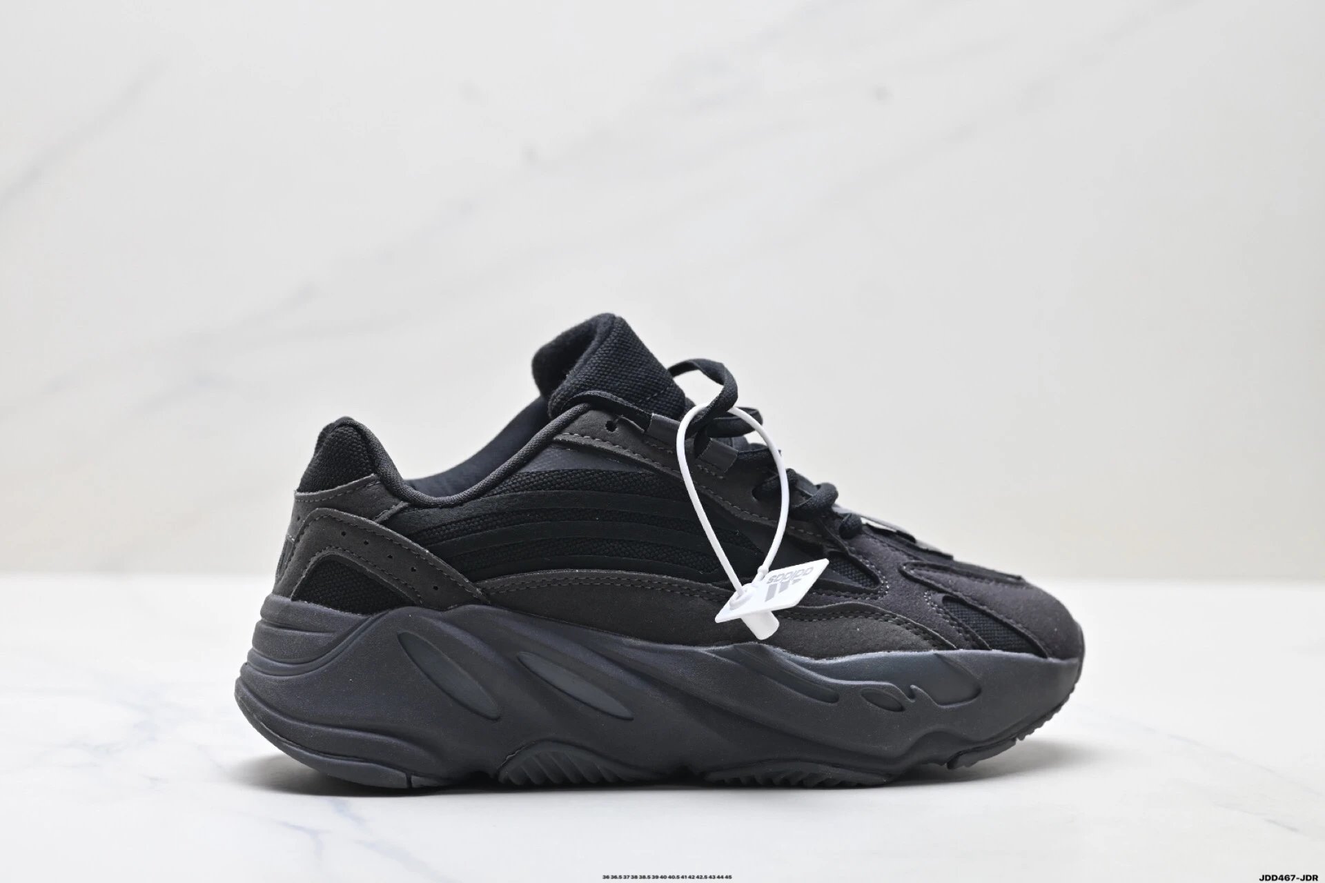 Retro-style black Yeezy 700 shoes