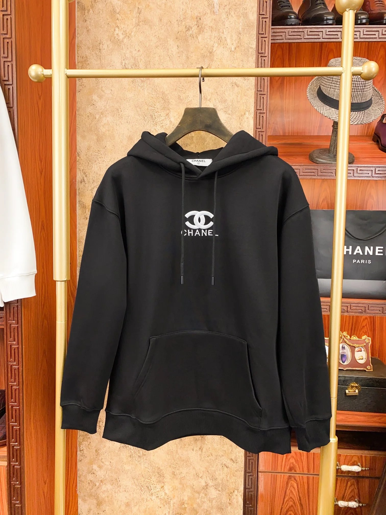Hoodie by Chanel with Black Pullover Hoodie with White