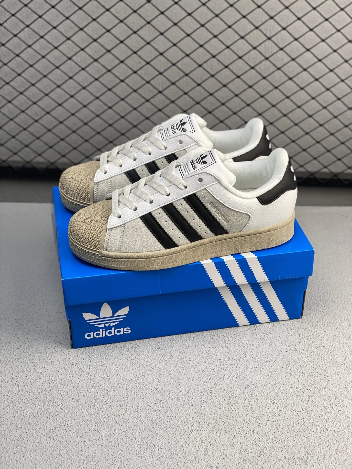 Adidas White and Black Shell-Toe Sneakers and Serrated Side Stripes