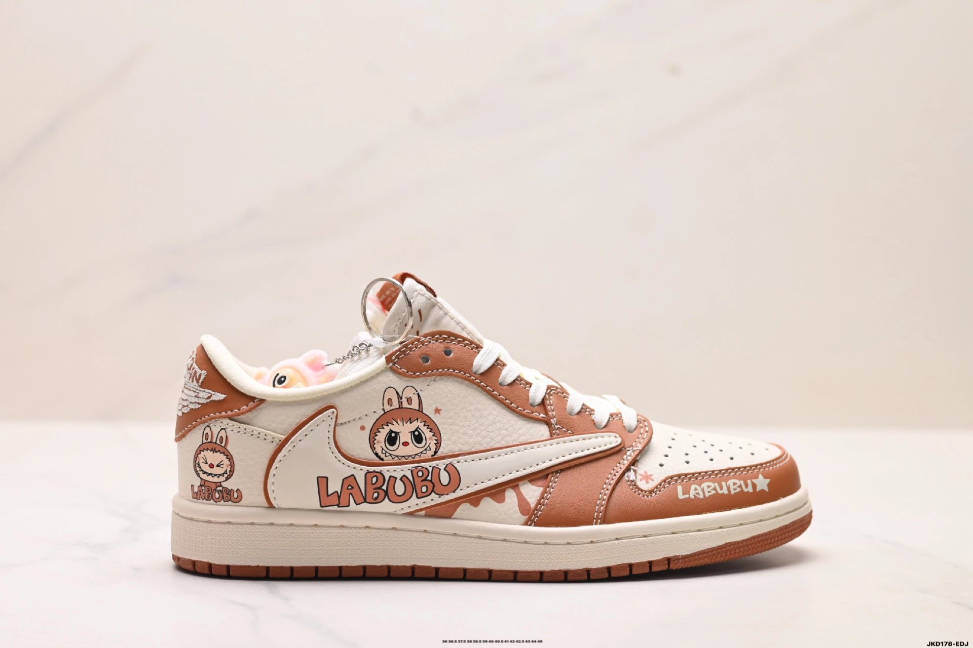 Nike co-branded cartoon-style brown and white shoes