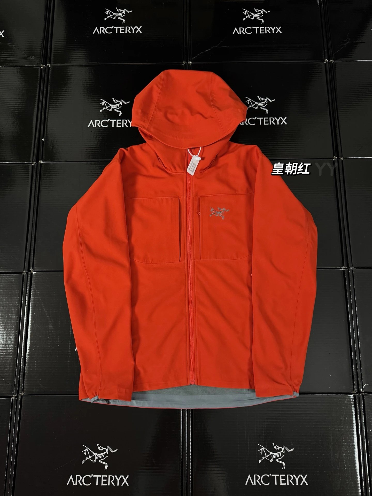 The imperial red of the Arc'teryx Alpha SV jacket