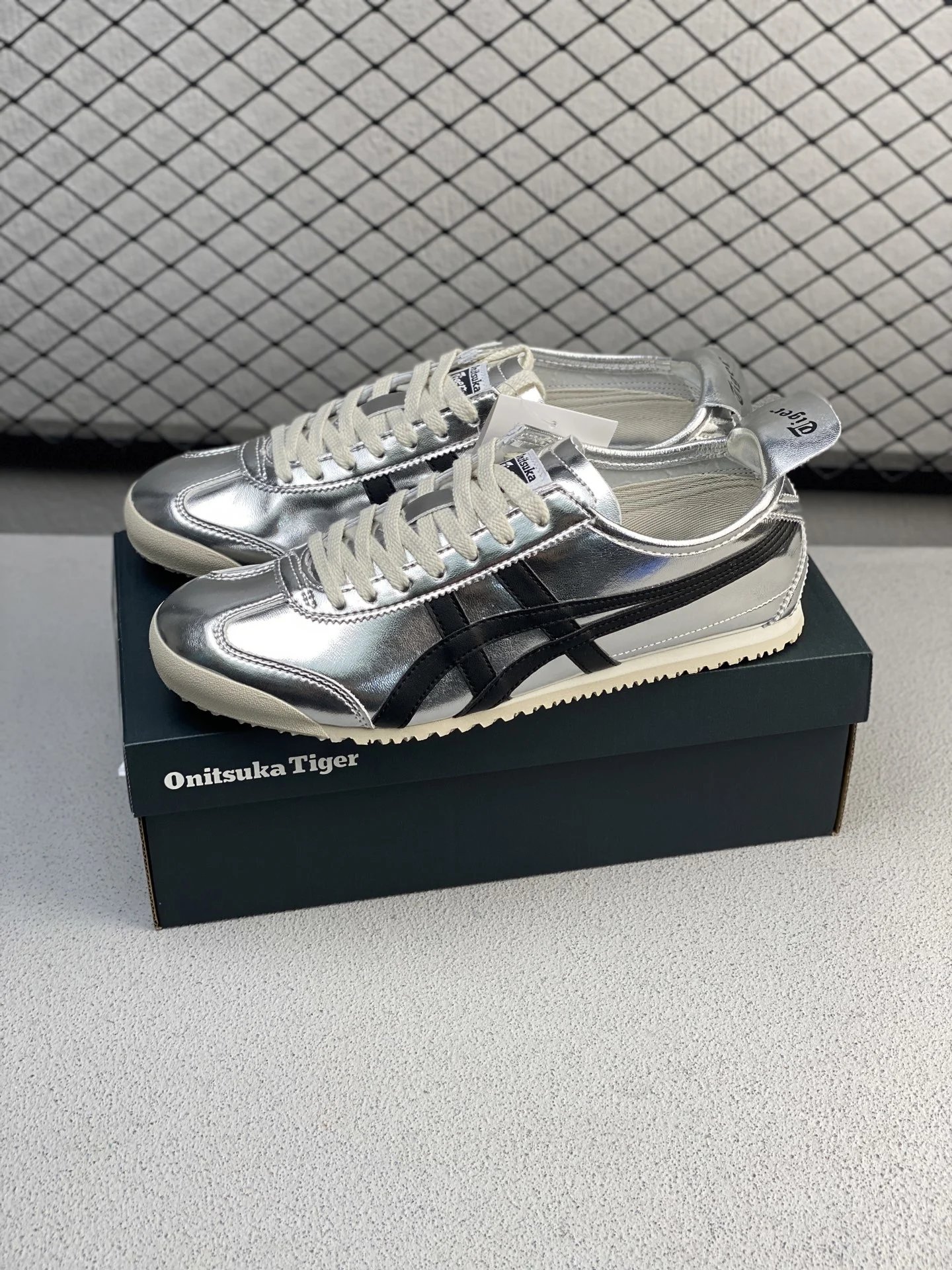 Onitsuka Tiger Metallic Silver and Black Low-Top Sneakers Defined by Tonal Toe Panel