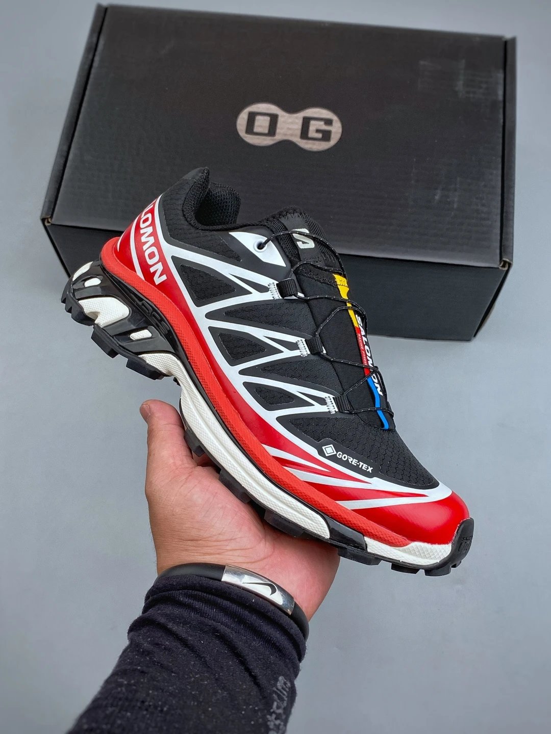 Salomon Black and Red Trail Runners Featuring Treaded Trail Sole