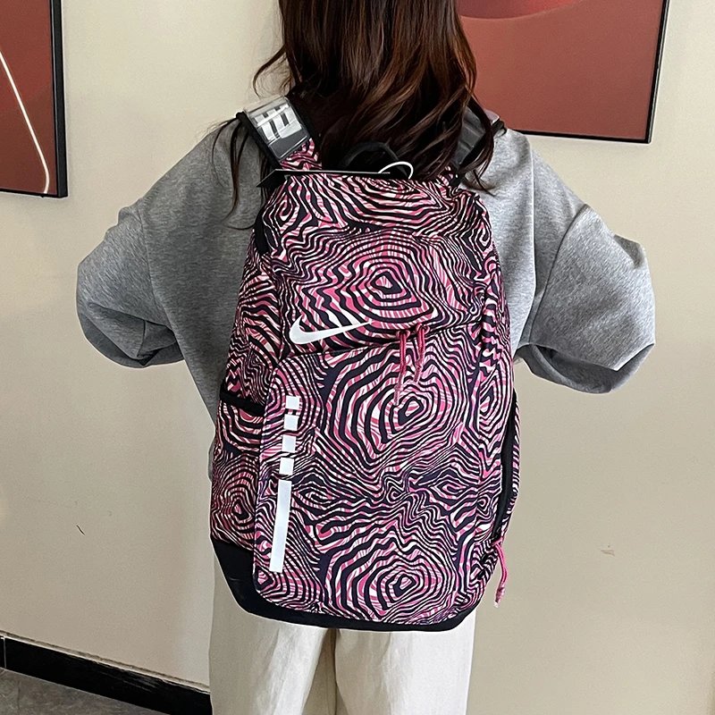 Nike Backpack with Pink Patterned Nike Backpack on for Daily Rotation