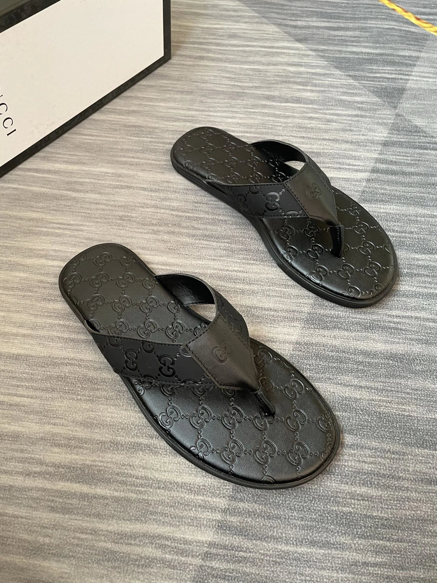 Gucci GG Embossed Light Luxury Style Black Flip-Flops
