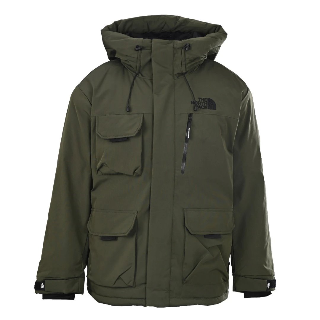The North Face Utility Hooded Parka with oversized flap pockets and a structured outdoor silhouette - Layering