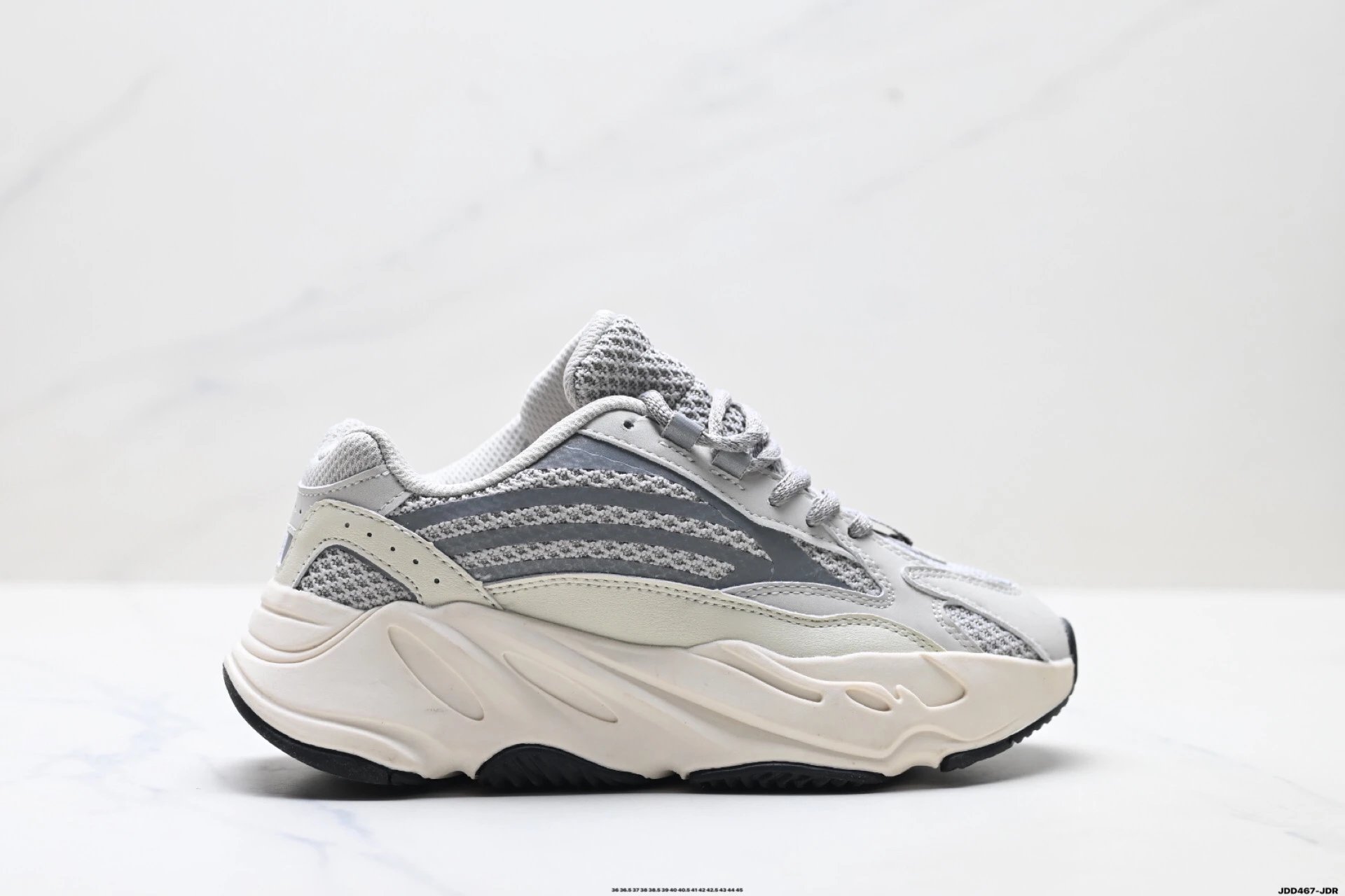 Adidas retro-style gray and white sports shoes