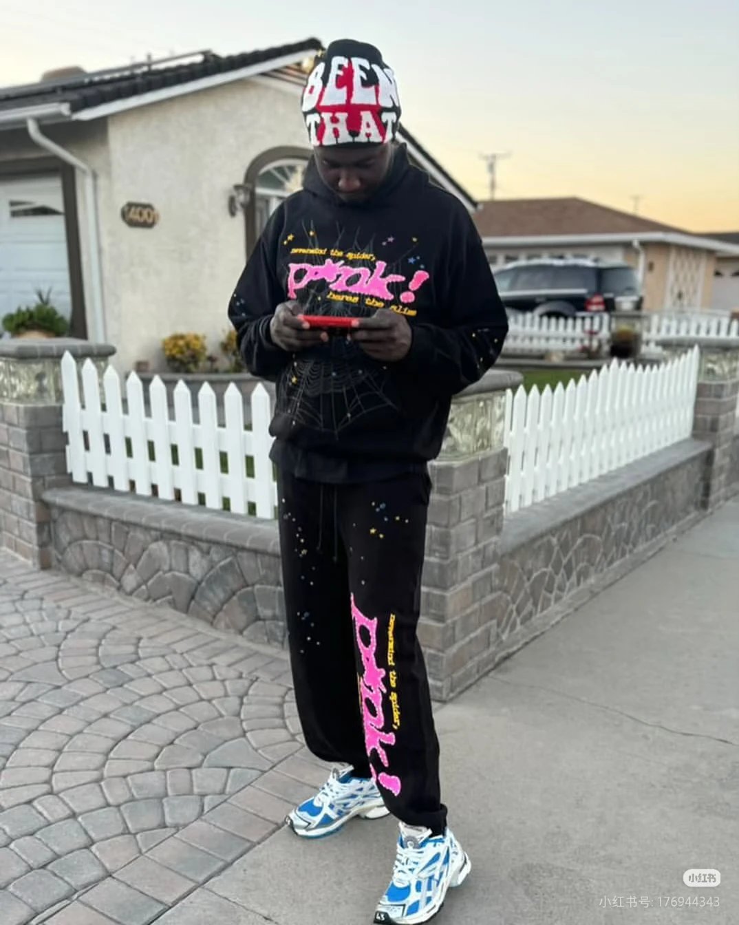 Streetwear Sweatpants with bright pink graphics and a relaxed cuffed fit - Sp5der Layering Edit