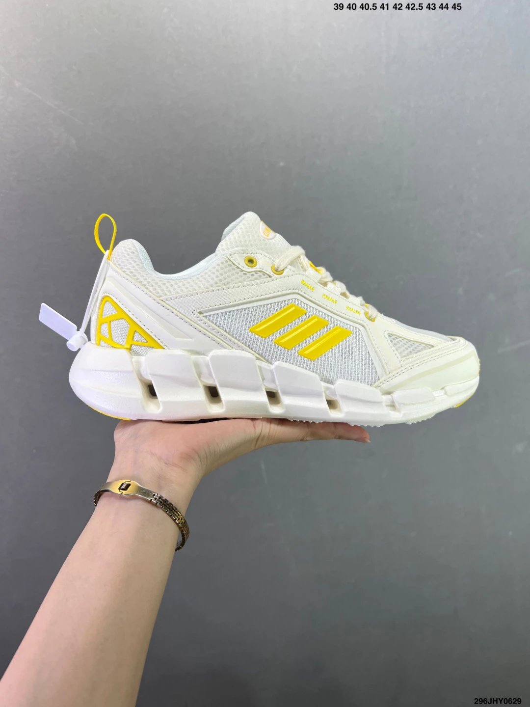 Adidas Cage Runners in White and Yellow with Dynamic Sole Shape