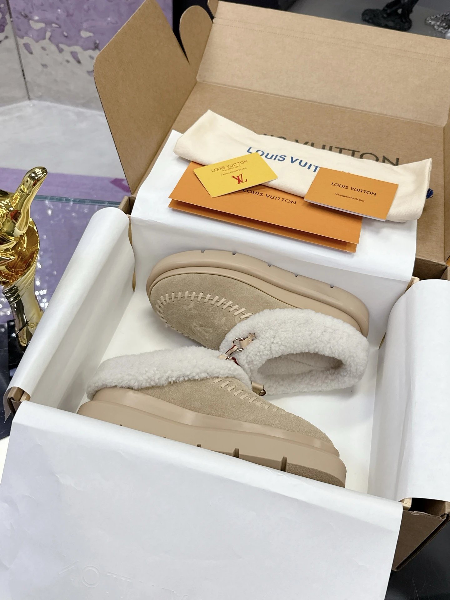 Louis Vuitton Shearling Slippers with Beige Shearling Lined Slip-on Pair for Casual Outfits