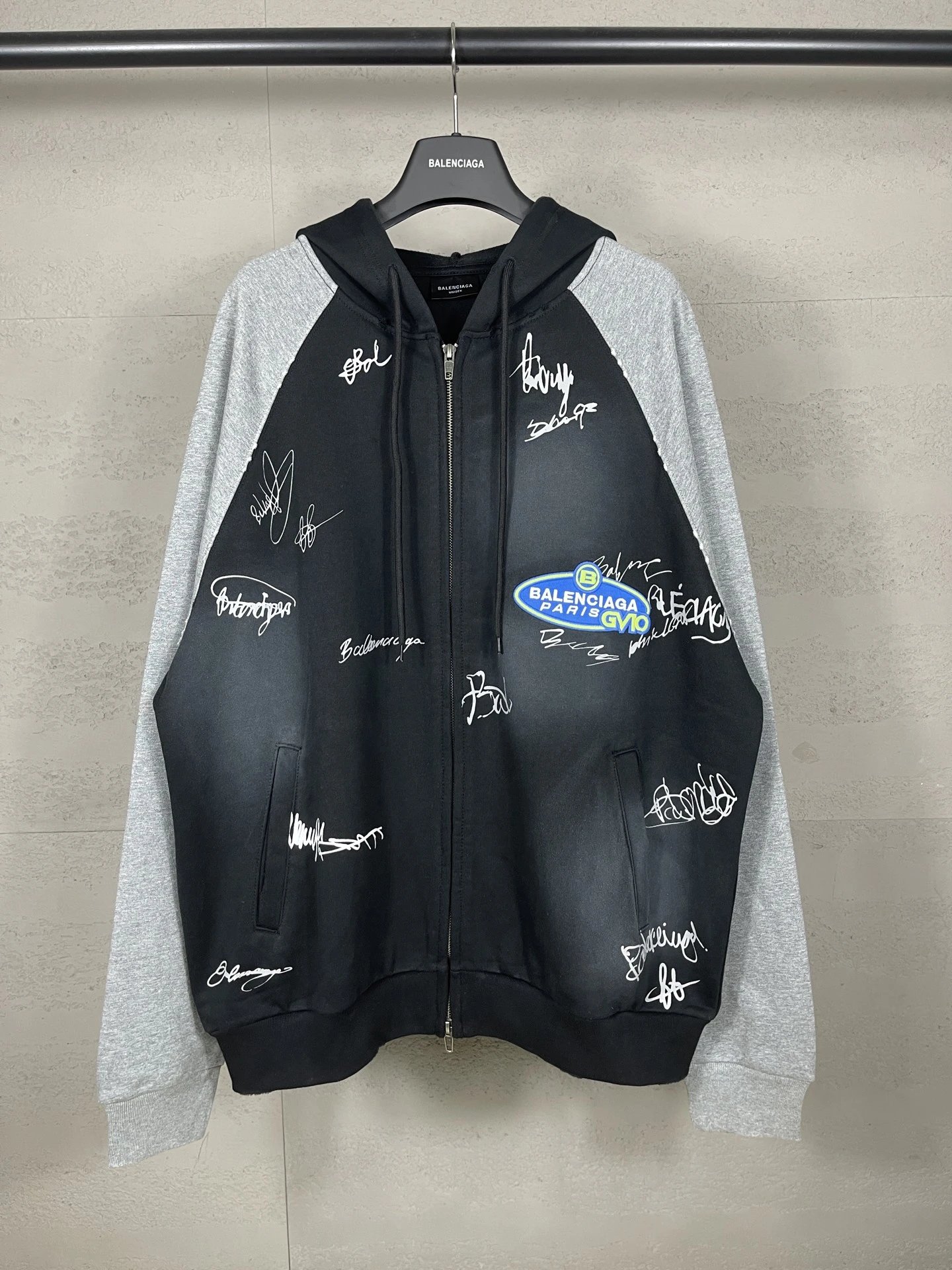Balenciaga graffiti-style black and grey hoodie