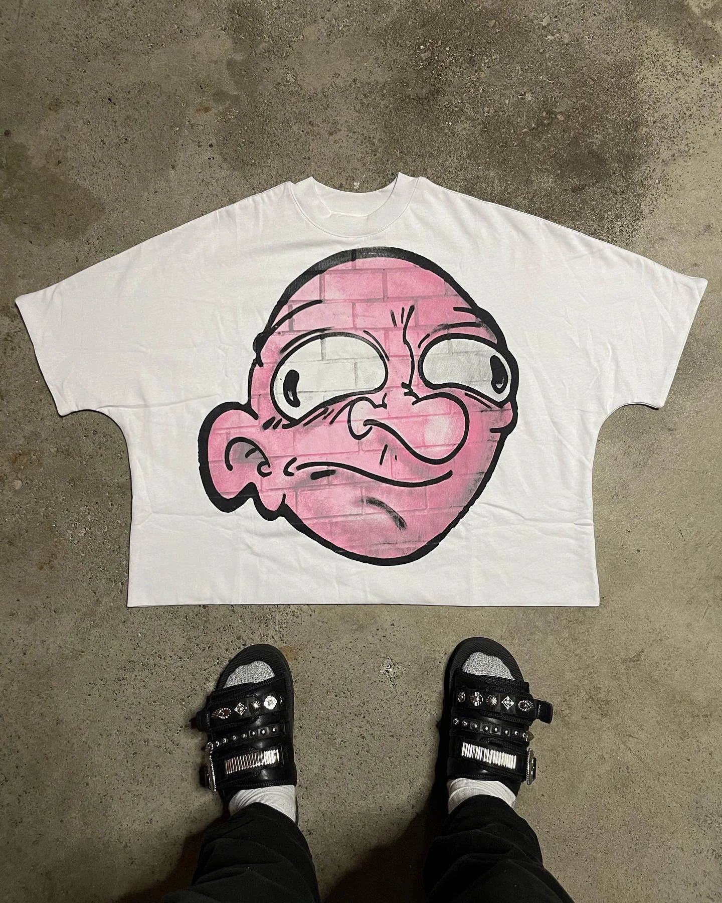 Cartoon-style white T-shirt for billionaires