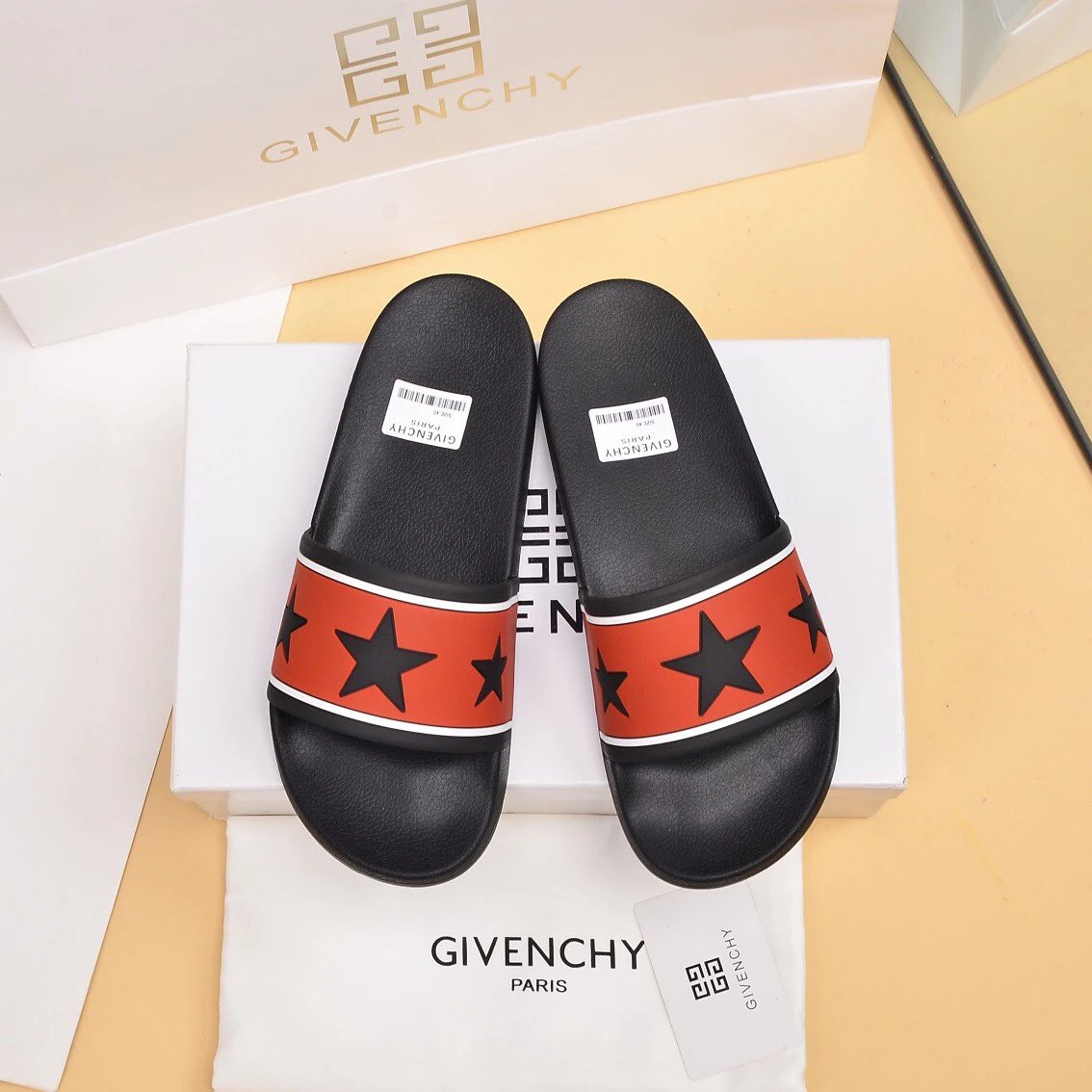 Givenchy Trendy Star Print Orange and Black Slide Sandals