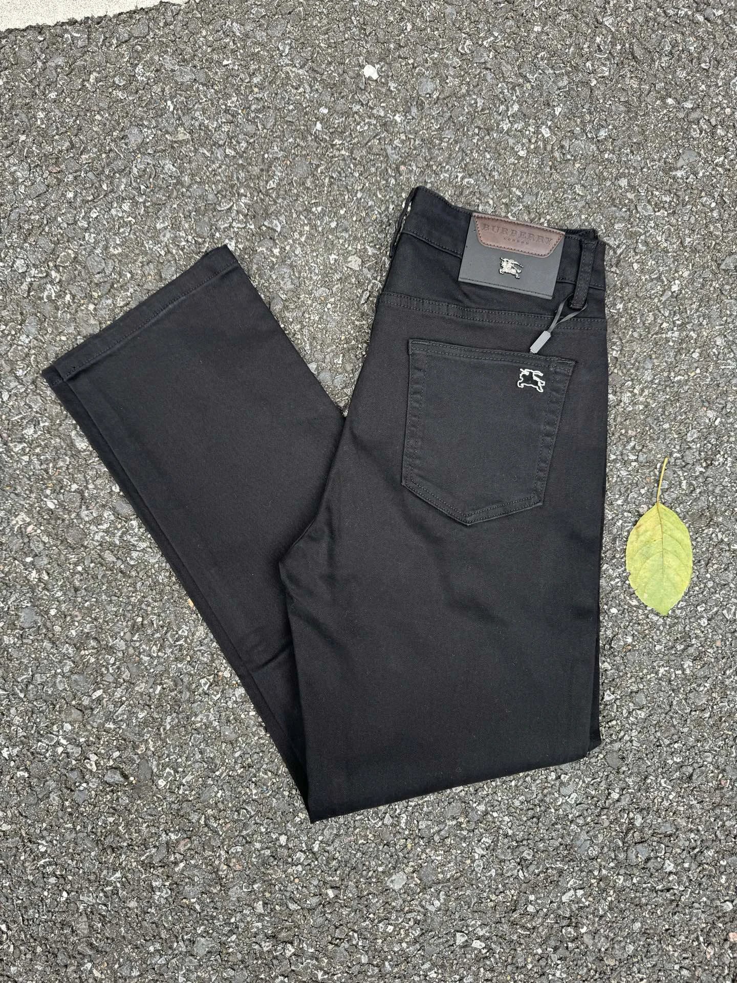 Black Slim Casual Pants by Burberry - Daily Edit