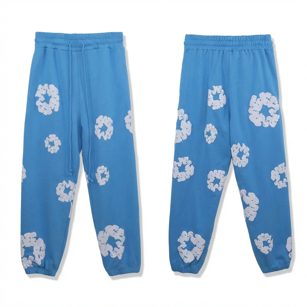 Blue casual pants with DENIM TEARS print