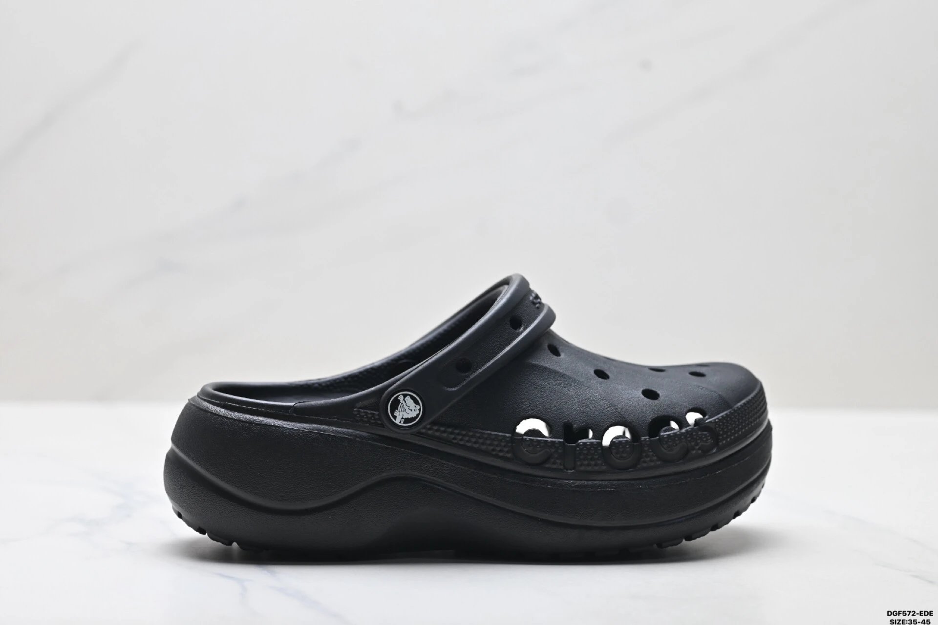 Black thick - soled Crocs clogs.