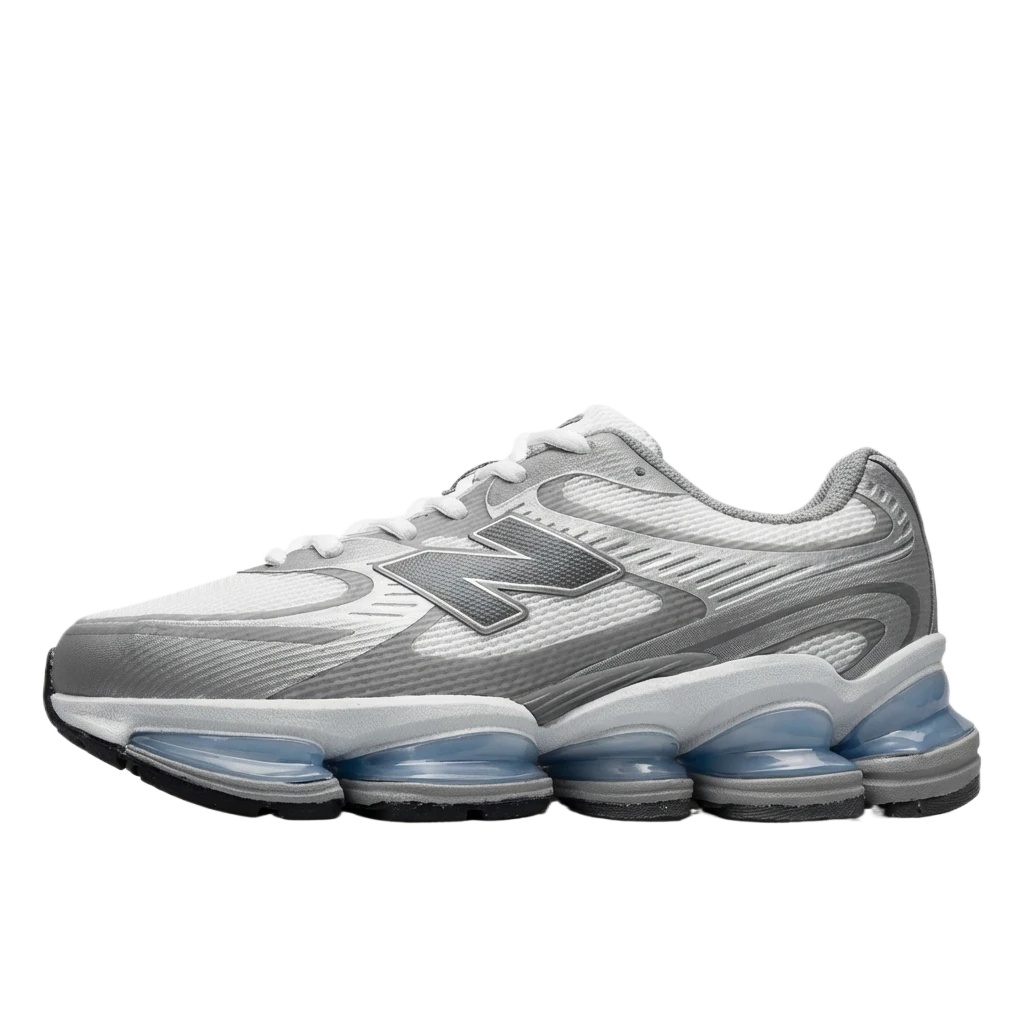 New Balance retro-style silver and white sports shoes