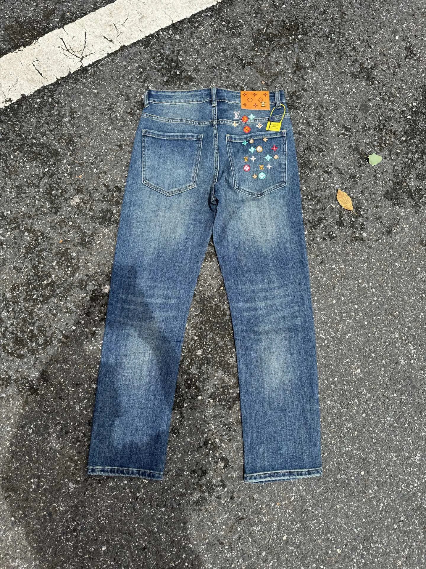Streetwear Embellished Jeans by Evisu - Medium Blue