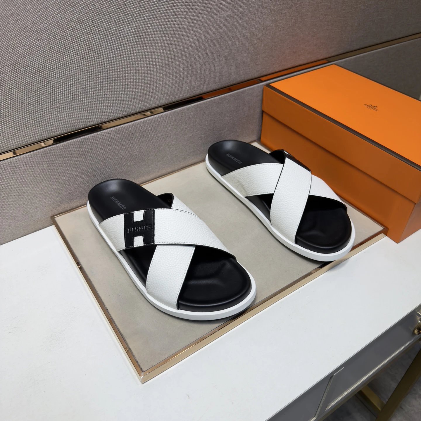 Hermès Crisscross Minimalist Style Black and White Slide Sandals