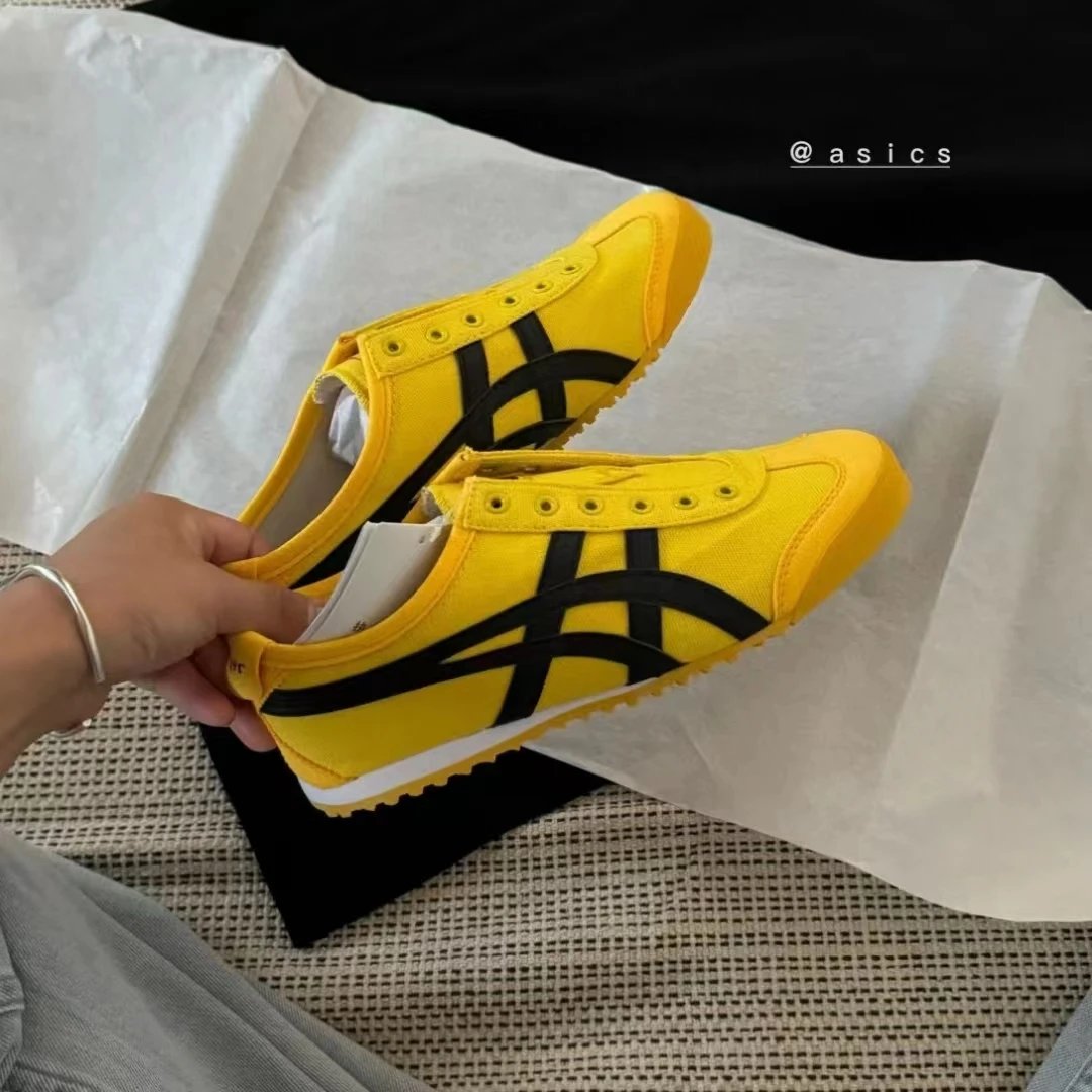 Asics Yellow and Black Low-Top Sneakers Defined by Retro Runner Panels