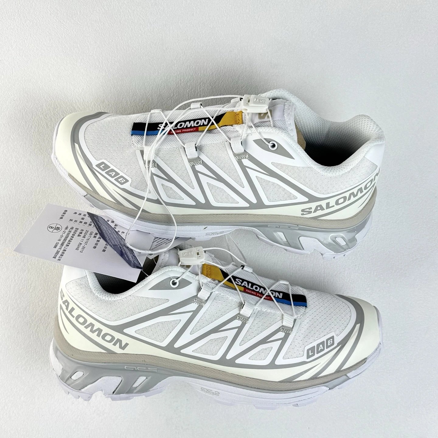 Salomon Trail Sneakers in White and Gray, Finished with Quick-Lace Style Cords