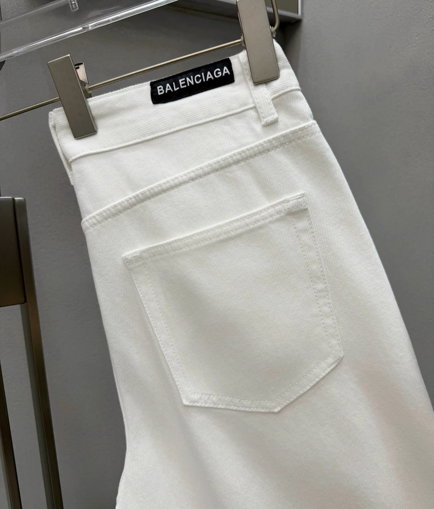 Balenciaga Logo Jeans in White - black waistband label and minimalist back pockets