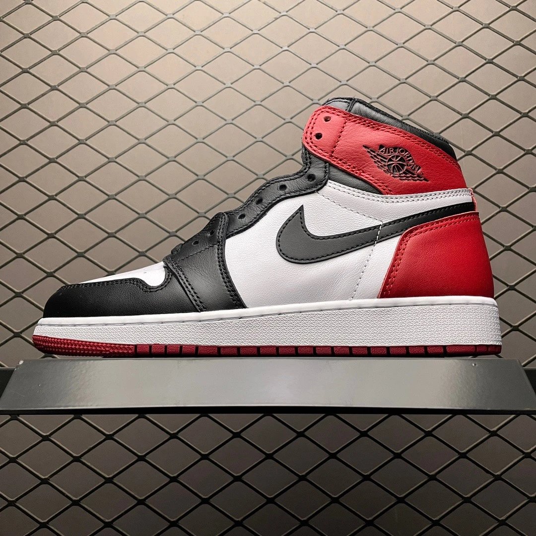 Jordan Black, White and Red Basketball High-Tops Defined by Sculpted Sole