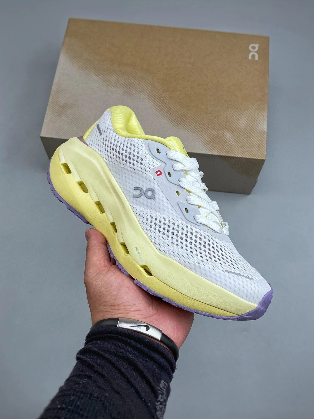 On Cloud Runners with Segmented Sole Pods in White and Neon