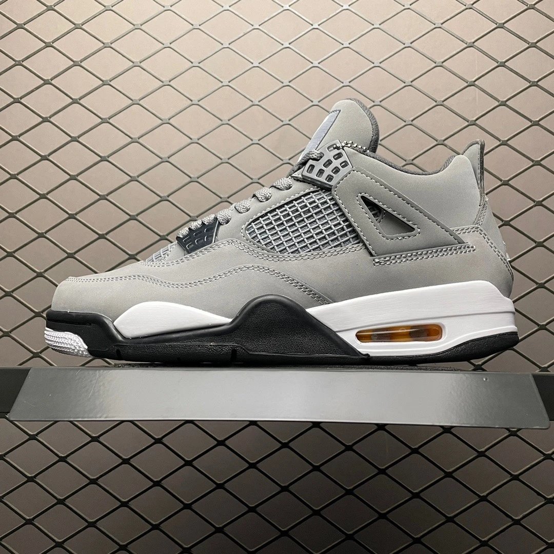 Jordan Gray and Black Basketball High-Tops Highlighting Color-Blocked Panels