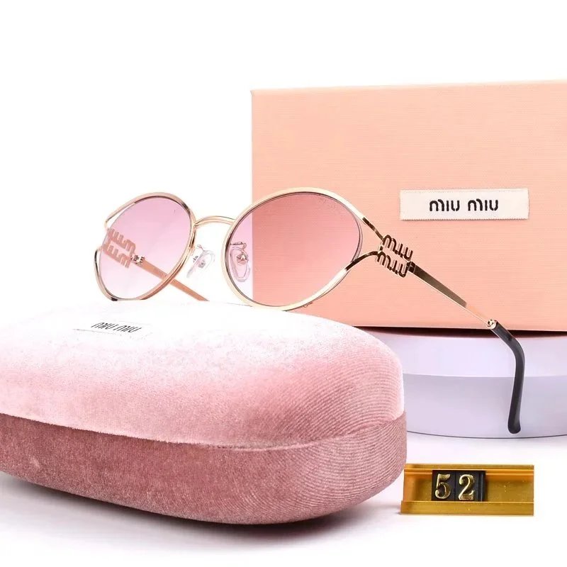 Miu Miu Statement Oversized sunglasses Black Oval Sunglasses for Easy Pairing