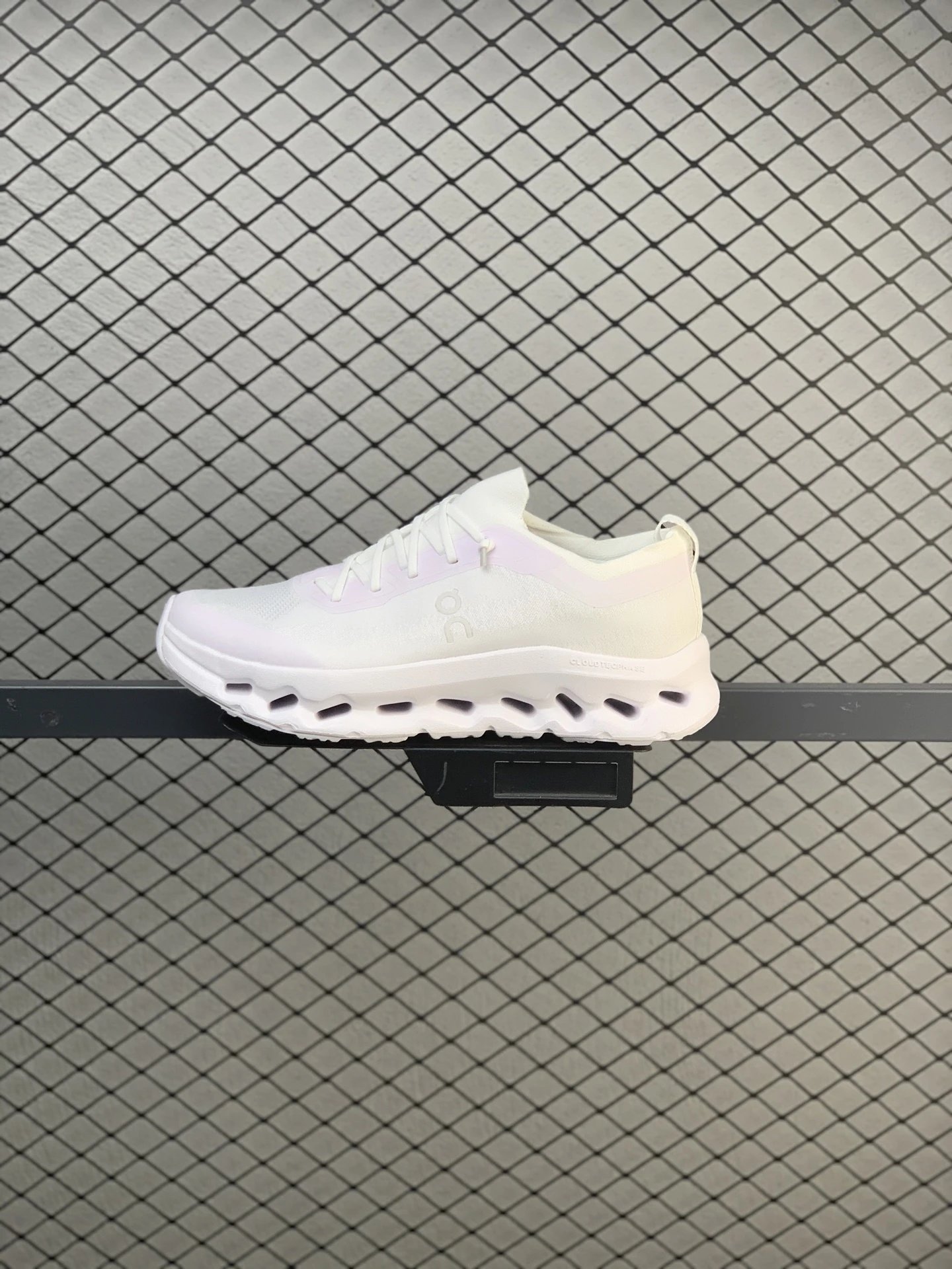 On White and Pastel Cloud Runners with Layered Mesh Upper