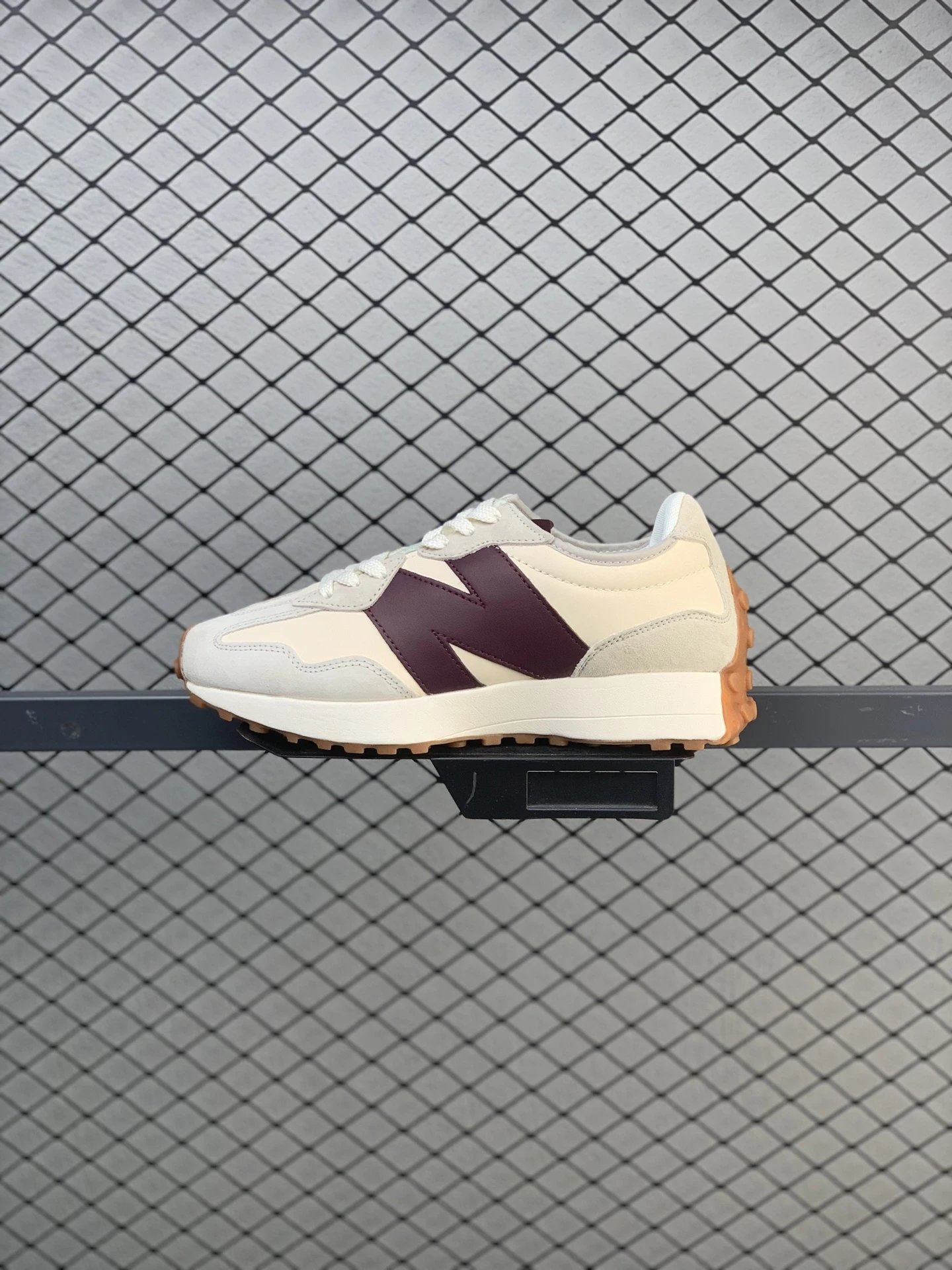 New Balance Cream and Burgundy Retro Runners Highlighting Textured Outsole