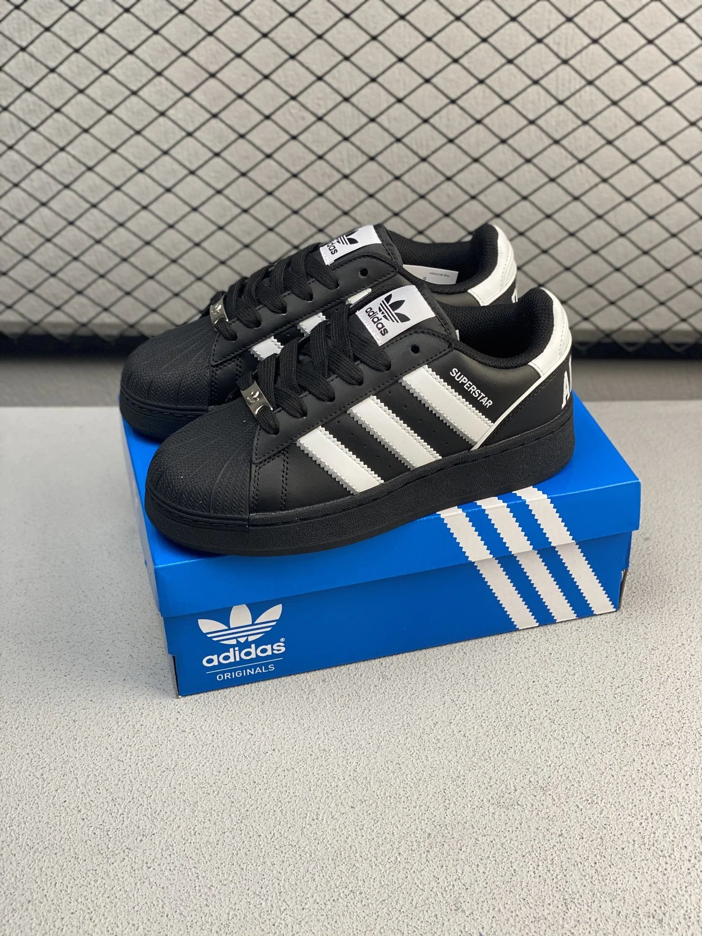 Adidas Shell-Toe Sneakers in Black and White, Finished with Retro Stripe Detail