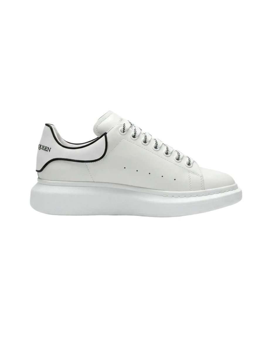 The minimalist style of McQueen white sneakers.